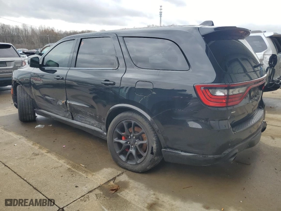 2021 Dodge Durango SRT 392 with VIN 1C4SDJGJ9MC574957, listed as a Copart auction lot 83679864 with 61,295 mi miles and Salvage Title. Bid and sale history available at carsss.com. Image 2.