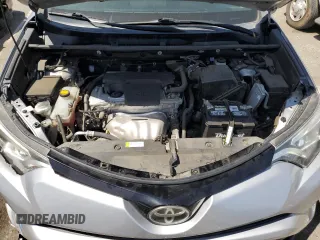 2016 Toyota RAV4 SE z VIN 2T3JFREV5GW499752, wystawiony jako Copart lot #62032045 z przebiegiem 77 711 mil mil oraz Szkoda całkowita • Salvage title. Historia ofert i sprzedaży dostępna na DreamBid. Obrazek 11.