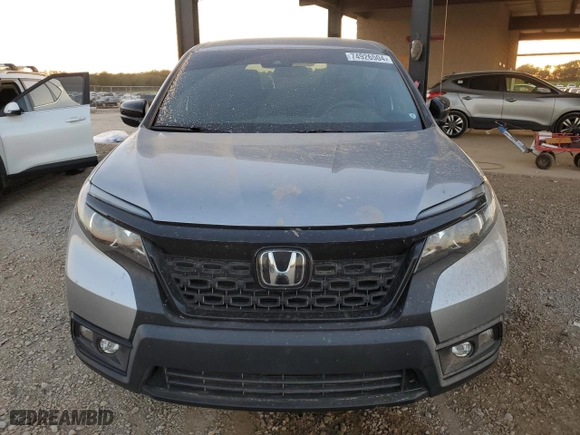 2021 Honda Passport Sport with VIN 5FNYF7H27MB007938, listed as a Copart auction lot 74926504 with 61,562 mi miles and Salvage Title. Bid and sale history available at carsss.com. Image 5.