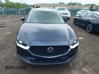 2022 Mazda CX-30 S Premium with VIN 3MVDMBDL0NM413545, listed as a IAAI auction lot 42493594 with 57,013 mi miles and . Bid and sale history available at DreamBid. Image 13.