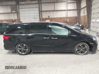 2023 Honda Odyssey Elite z VIN 5FNRL6H95PB016114, wystawiony jako IAAI lot #41865786 z przebiegiem 32 700 mil mil oraz . Historia ofert i sprzedaży dostępna na DreamBid. Obrazek 14.