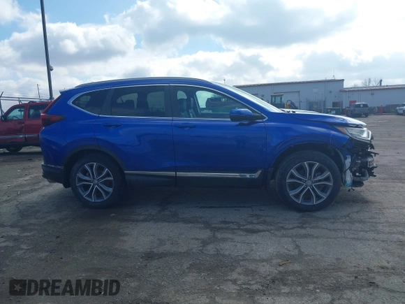 2020 Honda CR-V Touring with VIN 7FARW2H91LE012284, listed as a IAAI auction lot 41672460 with 28,207 mi miles and . Bid and sale history available at DreamBid. Image 14.