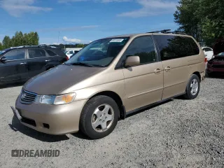 2001 Honda Odyssey EX with VIN 2HKRL18641H010449, listed as a Copart auction lot 63514645 with 304,474 mi miles and Salvage title. Bid and sale history available at DreamBid. Image 1.