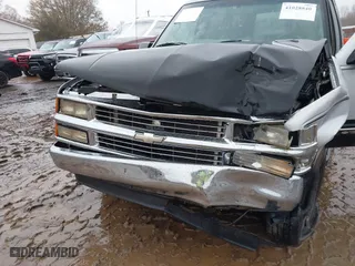 1997 Chevrolet Tahoe with VIN 1GNEK13R0VJ351919, listed as a IAAI auction lot 41028840 with 218,937 mi miles. Bid and sale history available at carsss.com. Image 11.