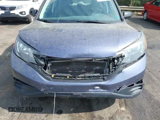 2014 Honda CR-V LX with VIN 3CZRM3H34EG702492, listed as a IAAI auction lot 42096296 with 63,748 mi miles and . Bid and sale history available at carsss.com. Image 6.