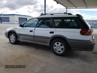 1997 Subaru Legacy Outback with VIN 4S3BG685XV6602836, listed as a Copart auction lot 47376925 with 236,913 mi miles and Salvage title. Bid and sale history available at DreamBid. Image 2.