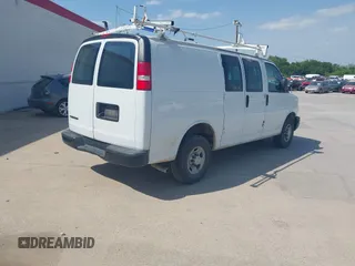 2019 Chevrolet Express Cargo Van with VIN 1GCWGAFPXK1164773, listed as a IAAI auction lot 41984554 with 87,916 mi miles. Bid and sale history available at carsss.com. Image 4.