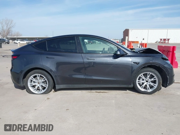 2024 Tesla Model Y with VIN 7SAYGDED9RF044789, listed as a IAAI auction lot 41817318 with Not Provided miles and . Bid and sale history available at DreamBid. Image 13.
