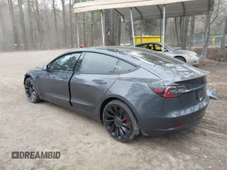 2021 Tesla Model 3 Performance with VIN 5YJ3E1EC1MF925515, listed as a IAAI auction lot 41721548 with 36,478 mi miles and . Bid and sale history available at carsss.com. Image 3.