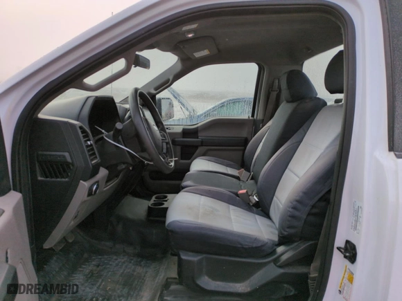 2019 Ford F-150 XL with VIN 1FTMF1CB9KKF27822, listed as a Copart auction lot 82123714 with 103,959 mi miles and Salvage Title. Bid and sale history available at carsss.com. Image 7.