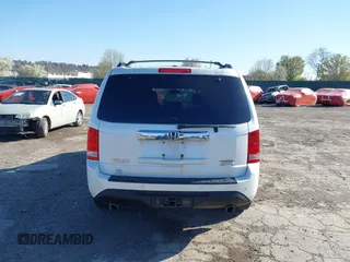 2012 Honda Pilot Touring with VIN 5FNYF4H98CB057659, listed as a IAAI auction lot 41927990 with 140,000 mi miles. Bid and sale history available at carsss.com. Image 16.