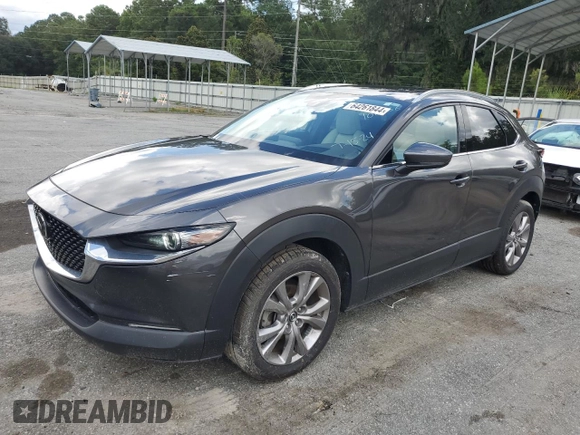 2020 Mazda CX-30 Premium with VIN 3MVDMAEM1LM100566, listed as a Copart auction lot 64261844 with 41,221 mi miles and Salvage title. Bid and sale history available at DreamBid. Image 1.