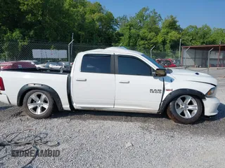 2013 Ram 1500 Sport z VIN 1C6RR7MT2DS571209, wystawiony jako IAAI lot #42635592 z przebiegiem 192 998 mil mil oraz . Historia ofert i sprzedaży dostępna na DreamBid. Obrazek 13.