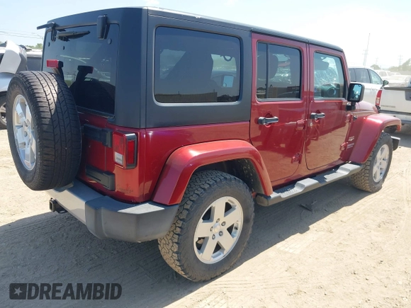 2012 Jeep Wrangler Unlimited Sahara with VIN 1C4BJWEG2CL209600, listed as a IAAI auction lot 42015290 with 133,229 mi miles and . Bid and sale history available at DreamBid. Image 4.