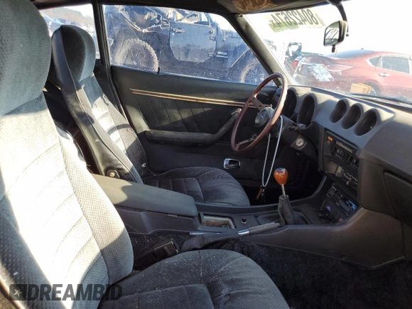 1978 Datsun 280ZX z VIN HLS30436722, wystawiony jako Copart lot #80422674 z przebiegiem 80 326 mil mil oraz Tytuł czysty. Historia ofert i sprzedaży dostępna na DreamBid. Obrazek 10.