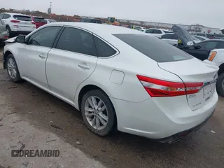 2013 Toyota Avalon XLE with VIN 4T1BK1EB8DU076613, listed as a IAAI auction lot 41709842 with 60,889 mi miles and . Bid and sale history available at DreamBid. Image 3.