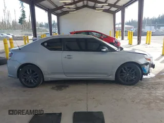 2014 Scion tC with VIN JTKJF5C71E3069593, listed as a IAAI auction lot 41901040 with 86,231 mi miles. Bid and sale history available at carsss.com. Image 13.