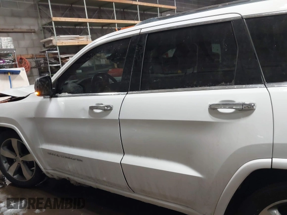 2015 Jeep Grand Cherokee Overland with VIN 1C4RJFCG2FC741015, listed as a IAAI auction lot 41607606 with 132,038 mi miles and . Bid and sale history available at DreamBid. Image 14.