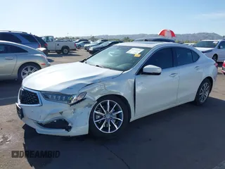 2019 Acura TLX with VIN 19UUB1F39KA011290, listed as a IAAI auction lot 42110094 with 63,450 mi miles and . Bid and sale history available at carsss.com. Image 2.