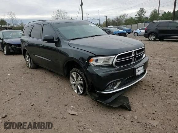 2014 Dodge Durango Limited z VIN 1C4RDJDG9EC595476, wystawiony jako Copart lot #53880355 z przebiegiem 85 723 mil mil oraz Szkody całkowita. Historia ofert i sprzedaży dostępna na DreamBid. Obrazek 14.