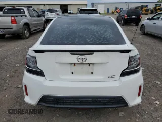 2014 Scion tC z VIN JTKJF5C70E3084411, wystawiony jako Copart lot #54255385 z przebiegiem 152 715 mil mil oraz Szkody całkowita. Historia ofert i sprzedaży dostępna na DreamBid. Obrazek 6.