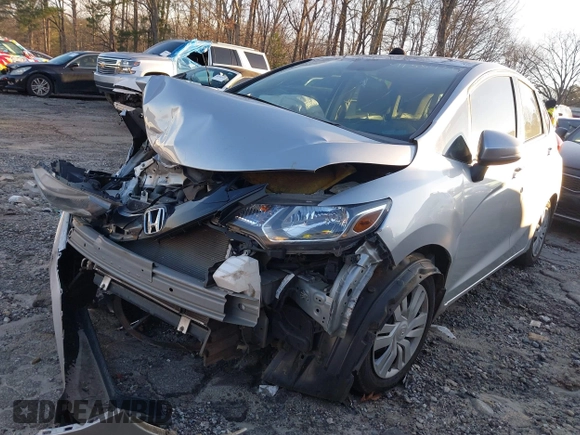 2016 Honda Fit LX with VIN JHMGK5H58GX003864, listed as a IAAI auction lot 41554364 with 258,819 mi miles. Bid and sale history available at carsss.com. Image 2.