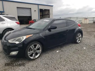 2013 Hyundai Veloster w/Gray Int z VIN KMHTC6AD4DU145710, wystawiony jako Copart lot #55677515 z przebiegiem 115 040 mil mil oraz Szkoda całkowita • Salvage title. Historia ofert i sprzedaży dostępna na DreamBid. Obrazek 1.