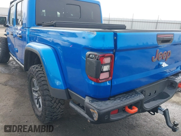 2024 Jeep Gladiator Mojave X z VIN 1C6JJTEG5RL121313, wystawiony jako IAAI lot #41013599 z przebiegiem 2 952 mil mil oraz . Historia ofert i sprzedaży dostępna na DreamBid. Obrazek 22.