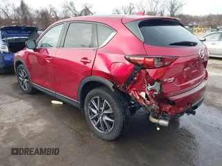 2018 Mazda CX-5 Grand Touring with VIN JM3KFBDM8J0406276, listed as a IAAI auction lot 41447355 with 70,772 mi miles. Bid and sale history available at carsss.com. Image 3.