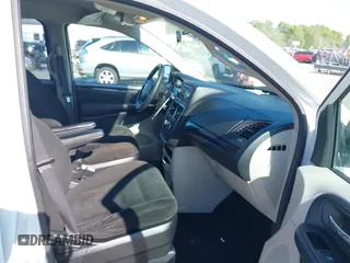 2015 Dodge Grand Caravan SE with VIN 2C4RDGBGXFR569435, listed as a IAAI auction lot 42057084 with 160,058 mi miles and . Bid and sale history available at DreamBid. Image 5.