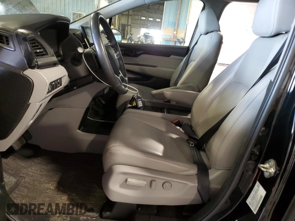 2021 Honda Odyssey Touring with VIN 5FNRL6H84MB009125, listed as a Copart auction lot 58248385 with 55,360 mi miles and Salvage title. Bid and sale history available at DreamBid. Image 7.