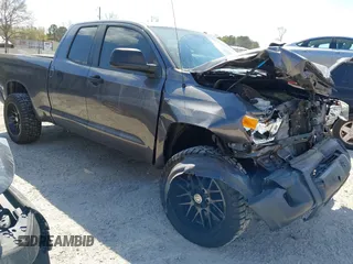 2014 Toyota Tundra 4WD Truck SR with VIN 5TFUM5F11EX055025, listed as a IAAI auction lot 41883017 with 100,565 mi miles. Bid and sale history available at carsss.com. Image 1.