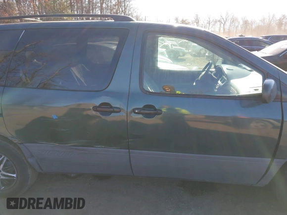 2001 Toyota Sienna LE z VIN 4T3ZF13C51U324527, wystawiony jako IAAI lot #41622465 z przebiegiem 145 450 mil mil oraz . Historia ofert i sprzedaży dostępna na DreamBid. Obrazek 13.