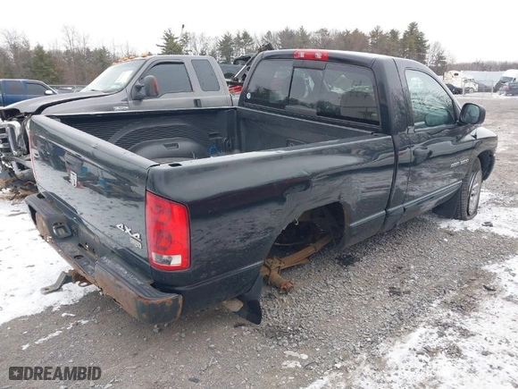 2005 Dodge Ram 1500 SLT with VIN 1D7HU16DX5J597138, listed as a IAAI auction lot 41319558 with 138,671 mi miles. Bid and sale history available at carsss.com. Image 4.