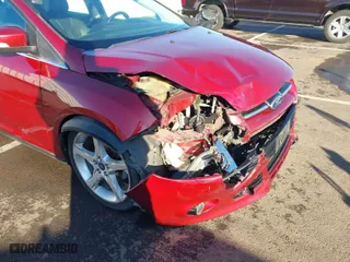 2014 Ford Focus Titanium with VIN 1FADP3J23EL137525, listed as a IAAI auction lot 41562684 with 127,104 mi miles. Bid and sale history available at carsss.com. Image 6.