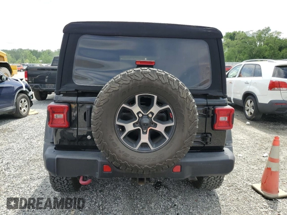 2018 Jeep Wrangler Unlimited Rubicon with VIN 1C4HJXFG8JW232955, listed as a Copart auction lot 49898225 with 22,717 mi miles and Salvage title. Bid and sale history available at DreamBid. Image 6.