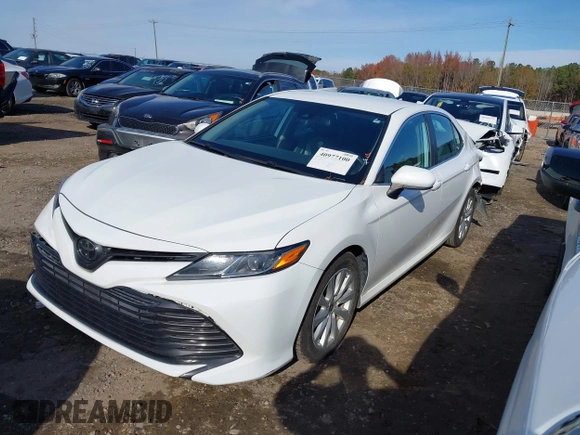2020 Toyota Camry LE with VIN 4T1C11AKXLU986310, listed as a IAAI auction lot 40977100 with 108,208 mi miles and . Bid and sale history available at DreamBid. Image 18.