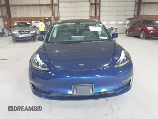 2022 Tesla Model 3 Long Range with VIN 5YJ3E1EB8NF255163, listed as a IAAI auction lot 42105451 with 40,166 mi miles and . Bid and sale history available at DreamBid. Image 12.