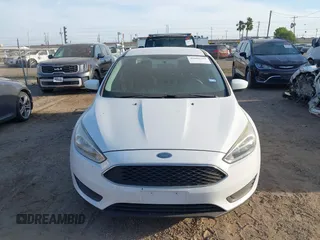 2018 Ford Focus SE z VIN 1FADP3F23JL328462, wystawiony jako IAAI lot #42068209 z przebiegiem 63 194 mil mil oraz . Historia ofert i sprzedaży dostępna na DreamBid. Obrazek 6.
