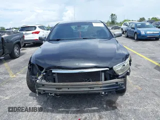 2013 Ford Taurus Limited with VIN 1FAHP2F84DG220283, listed as a IAAI auction lot 40045974 with 155,409 mi miles and . Bid and sale history available at DreamBid. Image 6.