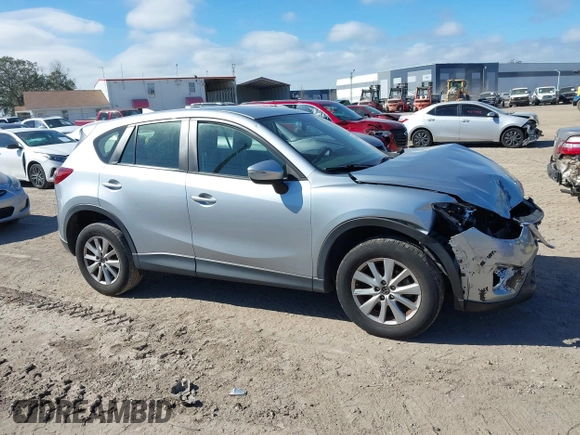 2016 Mazda CX-5 Sport with VIN JM3KE2BE9G0915168, listed as a IAAI auction lot 41482749 with 86,802 mi miles and . Bid and sale history available at carsss.com. Image 13.