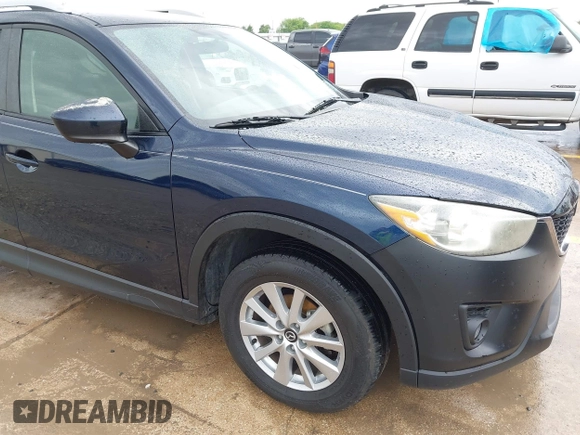 2015 Mazda CX-5 Touring with VIN JM3KE2CY5F0449195, listed as a IAAI auction lot 41894567 with 124,694 mi miles and . Bid and sale history available at DreamBid. Image 17.