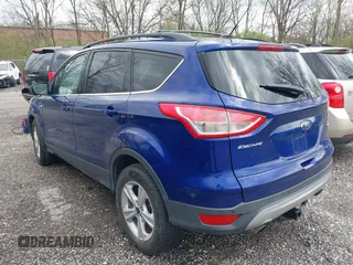 2016 Ford Escape SE z VIN 1FMCU9G99GUC32802, wystawiony jako IAAI lot #41958414 z przebiegiem 131 962 mil mil oraz . Historia ofert i sprzedaży dostępna na DreamBid. Obrazek 3.