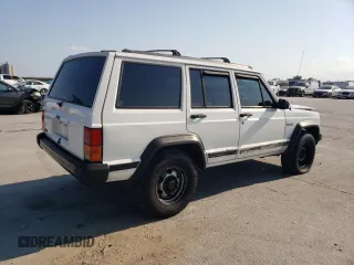 1996 Jeep Cherokee SE with VIN 1J4FT28S3TL197827, listed as a Copart auction lot 75443574 with 116,660 mi miles and Salvage Title. Bid and sale history available at carsss.com. Image 3.