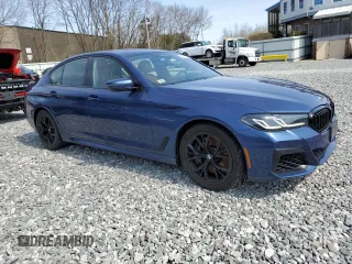 2022 BMW 5 Series 540i xDrive with VIN WBA73BJ07NCH66751, listed as a Copart auction lot 53653415 with 60,059 mi miles and Salvage title. Bid and sale history available at DreamBid. Image 4.