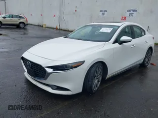 2020 Mazda 3 Premium with VIN 3MZBPBEMXLM133357, listed as a IAAI auction lot 41540234 with 81,280 mi miles and . Bid and sale history available at DreamBid. Image 19.