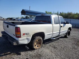 1999 GMC Sierra 1500 SLE z VIN 2GTEK19TXX1551778, wystawiony jako Copart lot #52279055 z przebiegiem 302 182 mil mil oraz Szkoda całkowita • Salvage title. Historia ofert i sprzedaży dostępna na DreamBid. Obrazek 3.