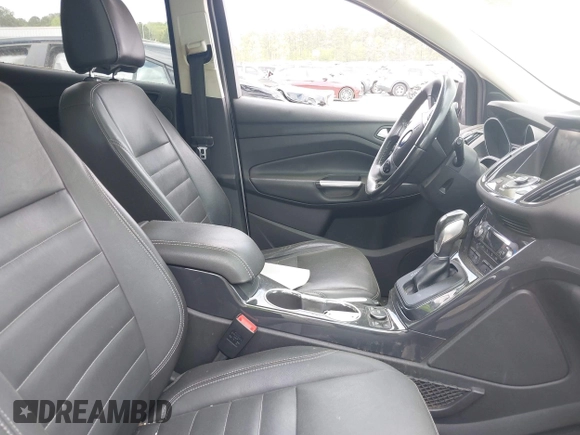 2015 Ford Escape Titanium with VIN 1FMCU0J98FUA87044, listed as a IAAI auction lot 41952096 with 257,437 mi miles. Bid and sale history available at carsss.com. Image 5.