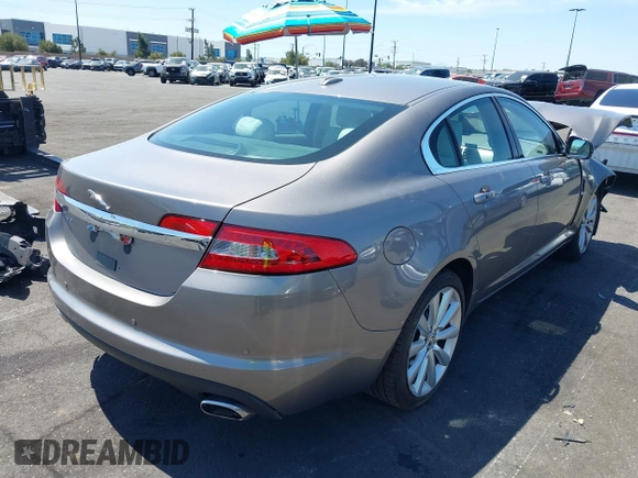 2010 Jaguar XF Premium Luxury with VIN SAJWA0GB6ALR77790, listed as a IAAI auction lot 41987113 with 69,094 mi miles. Bid and sale history available at carsss.com. Image 4.