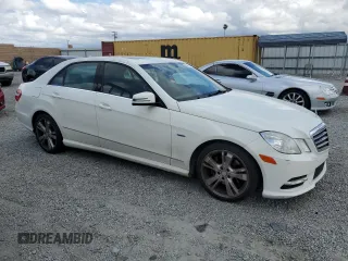 2012 Mercedes-Benz E 350 Luxury with VIN WDDHF5KB7CA586679, listed as a Copart auction lot 56893415 with 153,787 mi miles and Clean Title. Bid and sale history available at DreamBid. Image 4.